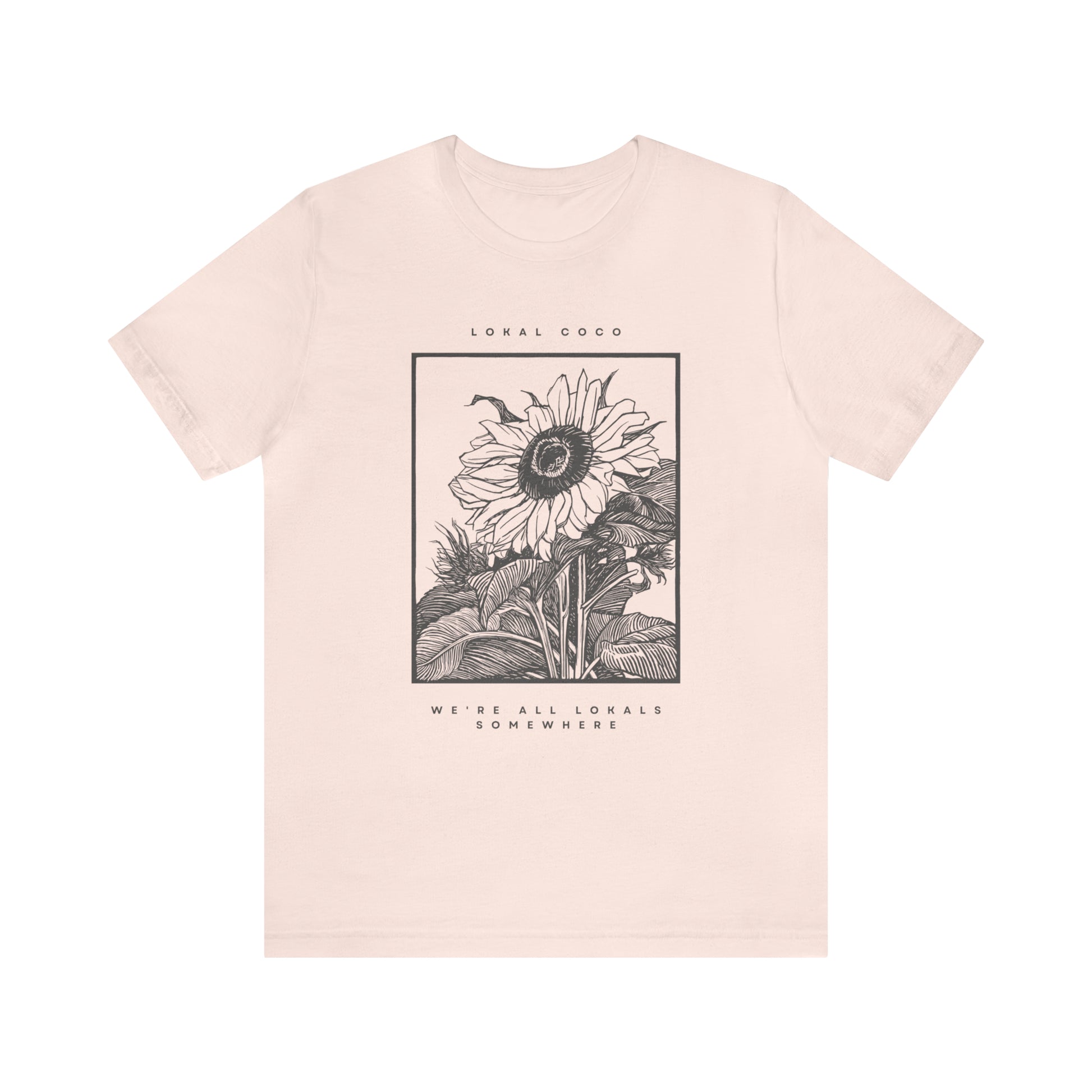 The front of Sunflower T-Shirt | Vintage Graphic Tee in soft pink