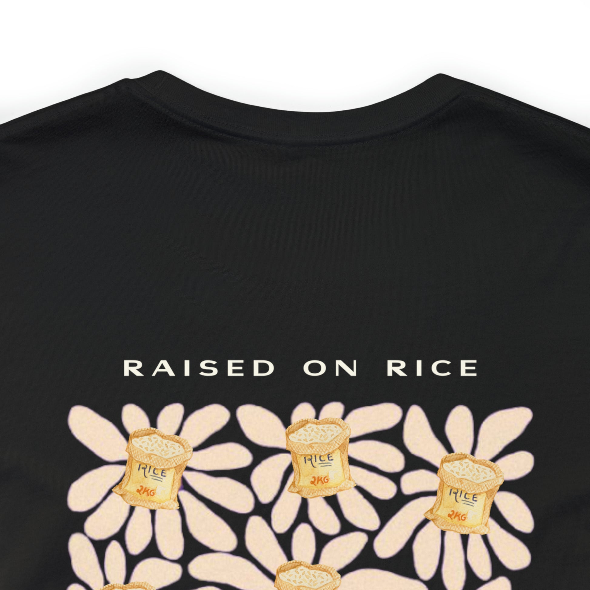 Up close image of the back of the Raised on Rice T-shirt in black